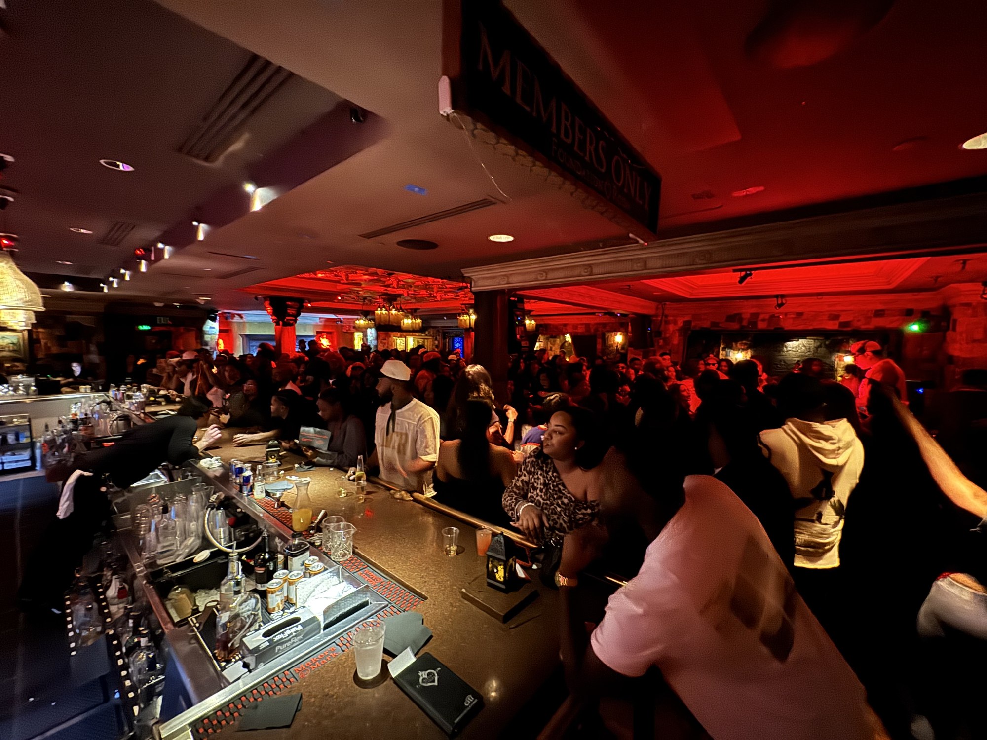 Packed crowd at a DJ FLYY club event